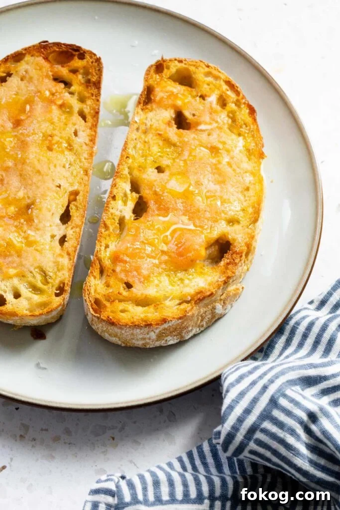 Crispy Air Fryer Toast Recipes for Quick Breakfasts 8 Air fryer pan con tomate on a plate