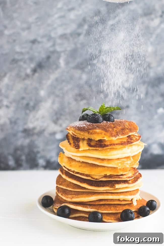 Fluffy Keto Pancakes Topped with Pure Maple Syrup 3 Pancakes With Maple Syrup