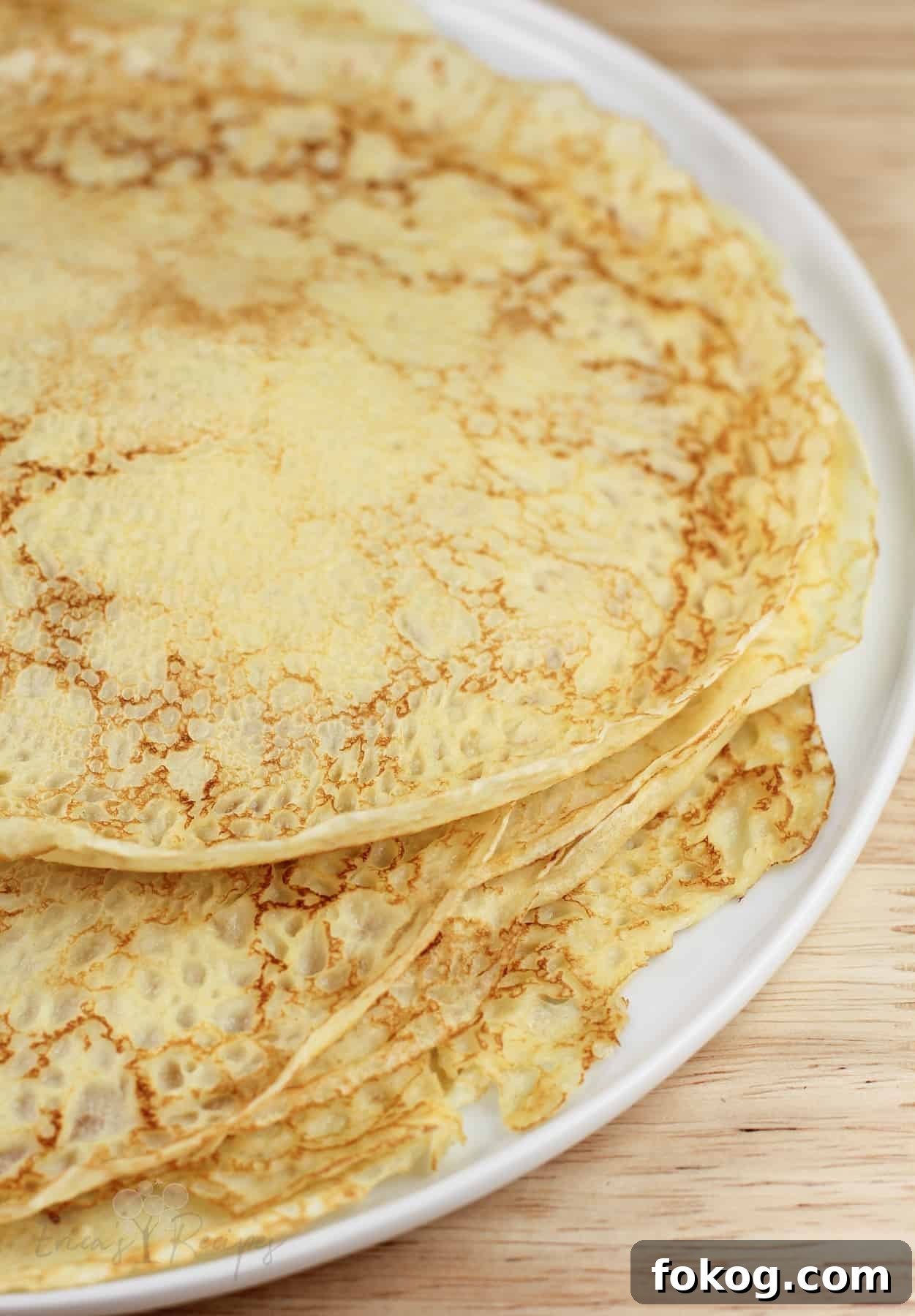 Smoked Salmon Crepes Recipe with Creamy Dill Filling 4 crepes stacked on white dish