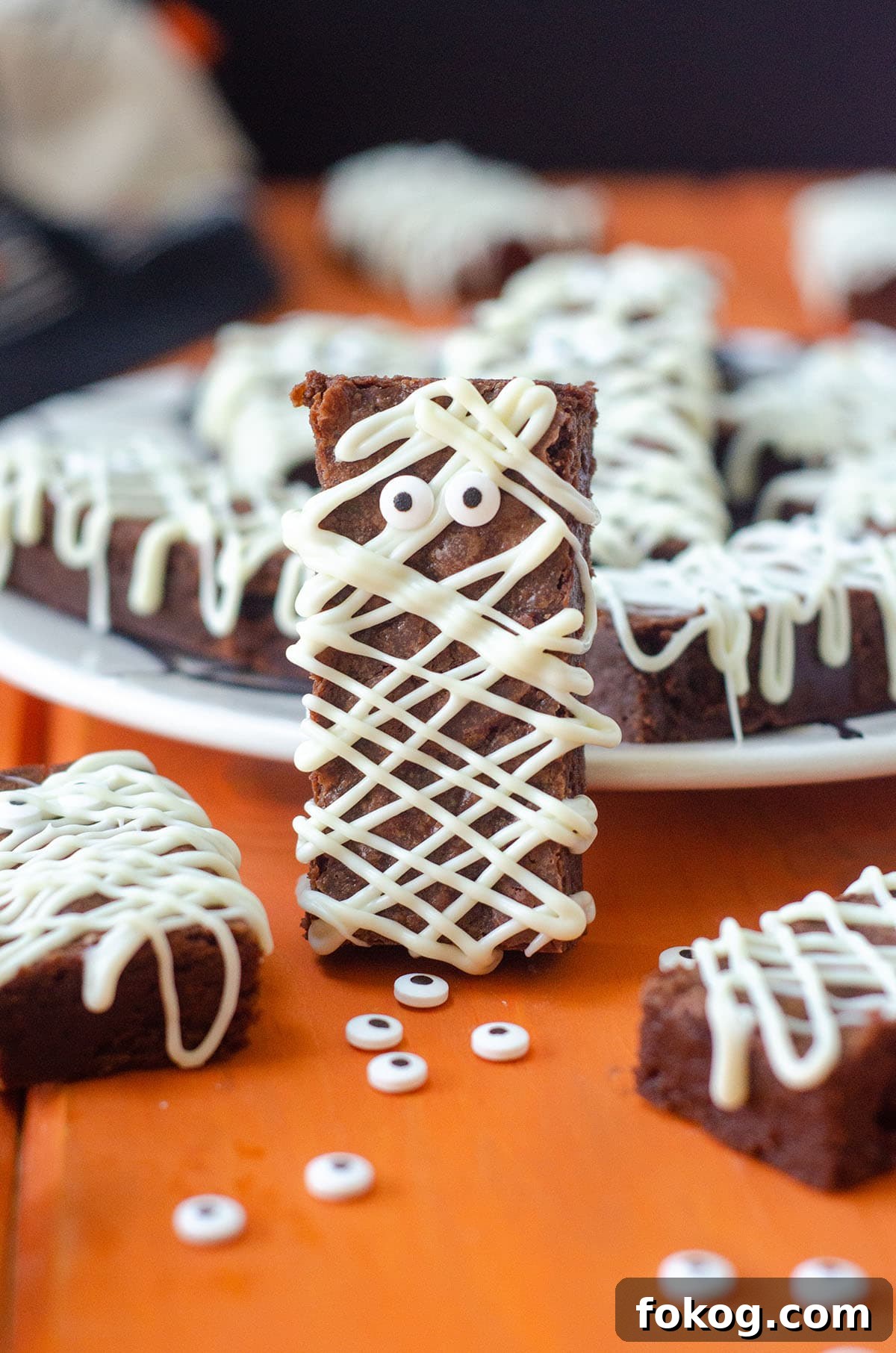 Rice Krispies Brains Recipe: Spooky Halloween Treats Tutorial 16 mummy brownies on a plate