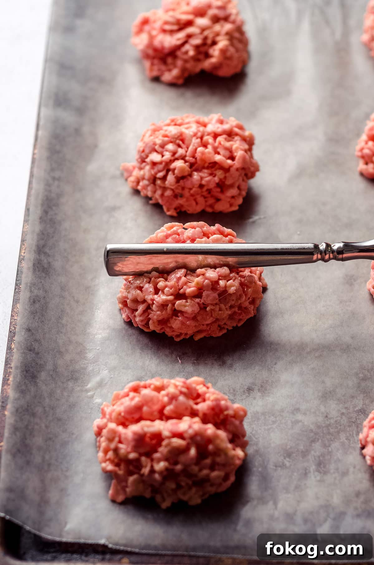 Rice Krispies Brains Recipe: Spooky Halloween Treats Tutorial 8 using a knife to make indentations in mounds of rice krispies treats to look like brains