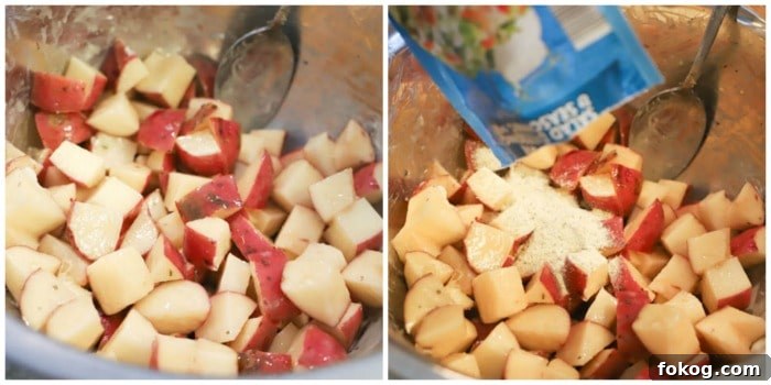 mixing potatoes with seasoning