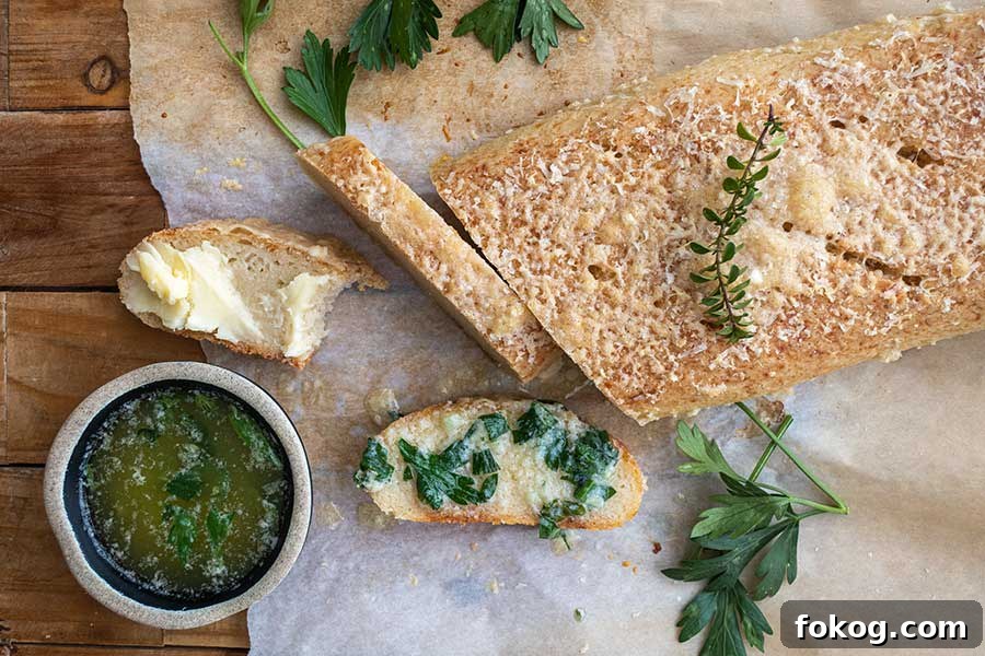 sliced gluten-free Italian Parmesan Bread, with a side of butter