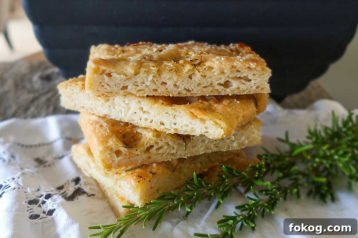 stacked focaccia pieces made with rosemary and garlic