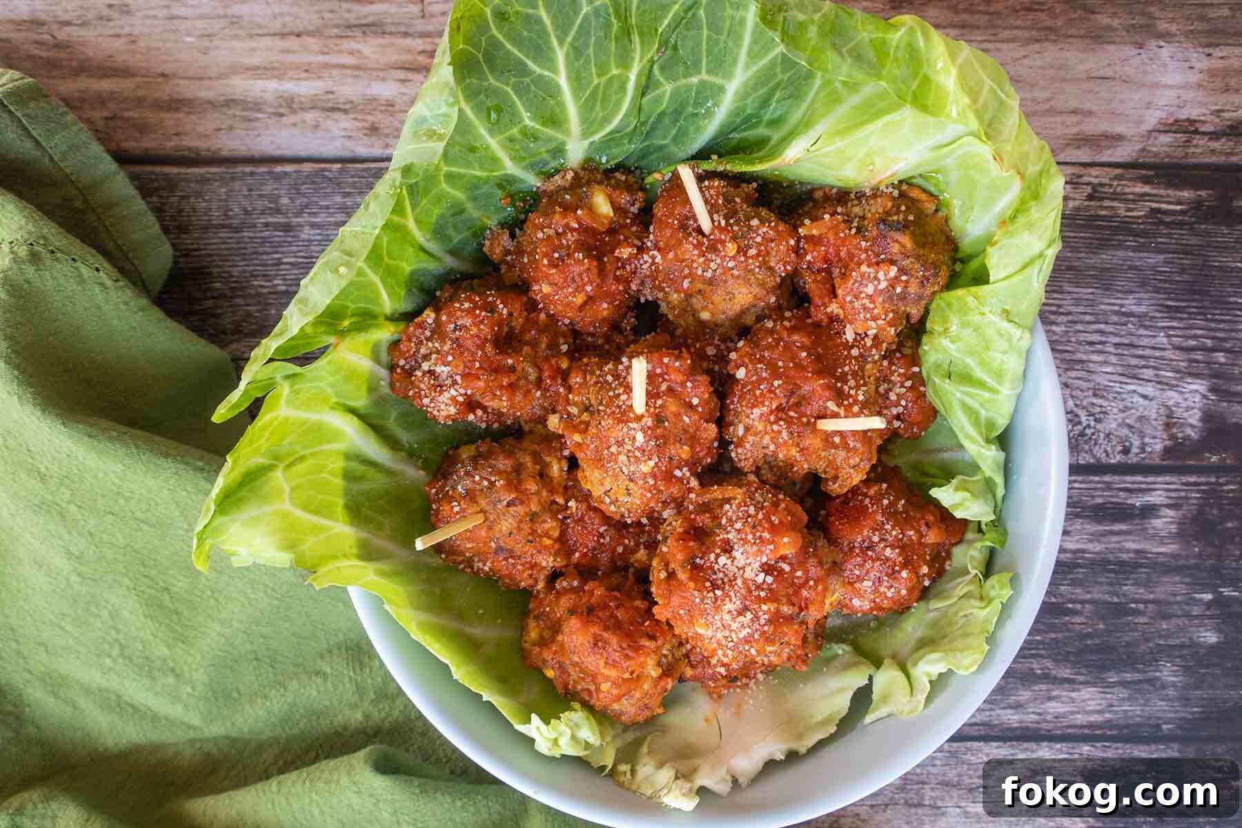 overview of gluten free baked meatballs in a cabbage leaf