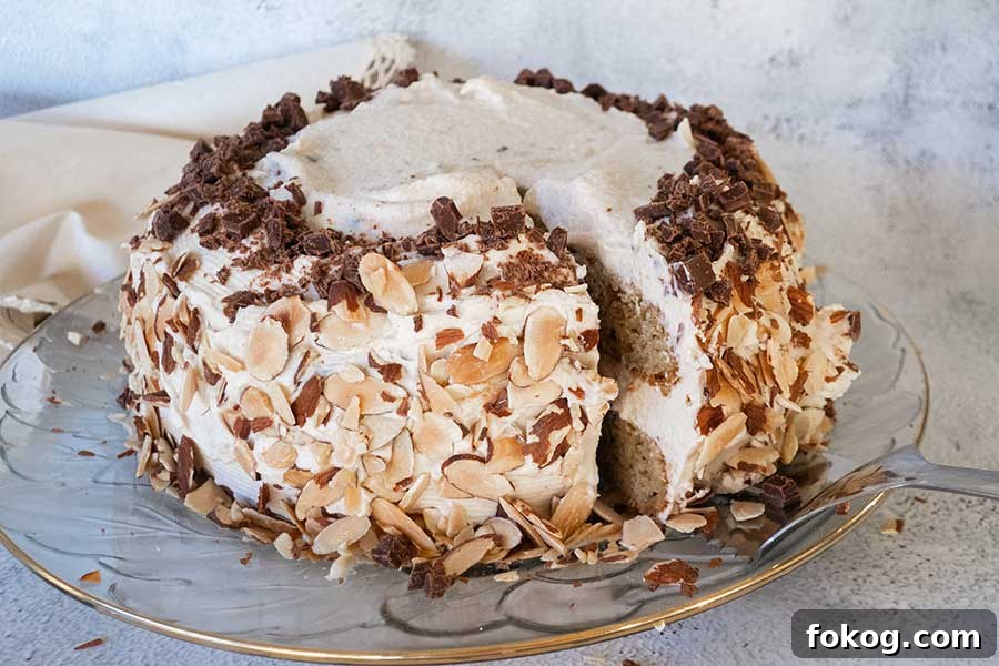 whole cannoli cake on a platter, decorated with shaved chocolate, gluten free