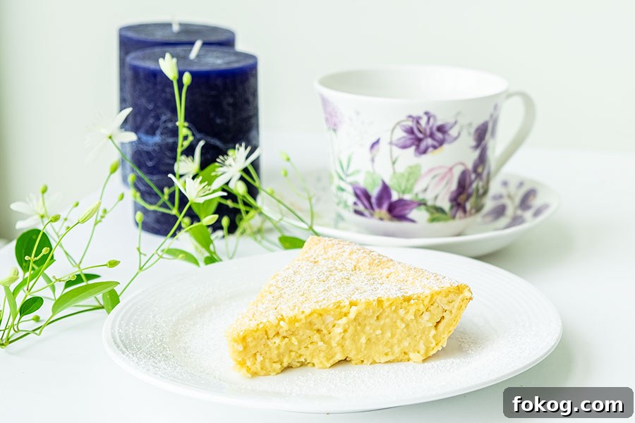 slice of gluten free lemon custard pie with coconut on a plate