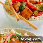 Two bowls of Hoisin Tofu Stir-fry. Vegan, GF & Healthy! Georgie Eats.