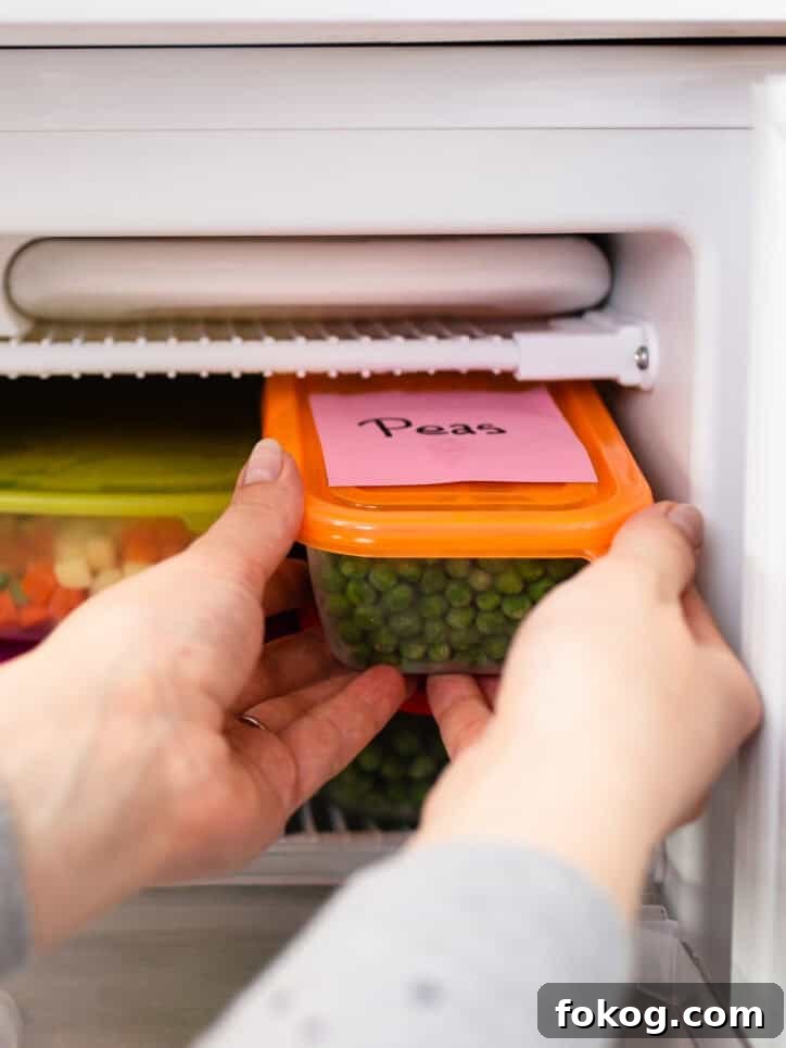 placing container in freezer.