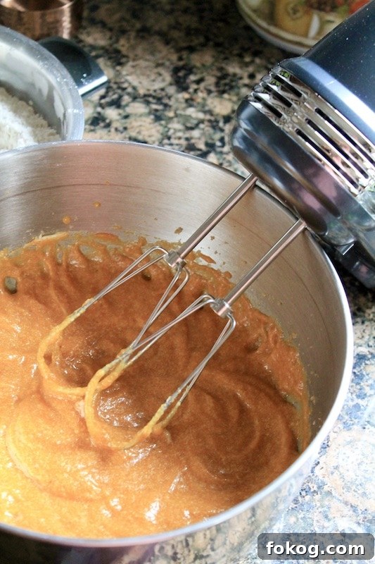 Fall Spice Pumpkin Bread Made with Libby’s Pumpkin Purée 9 mix wet ingredients together