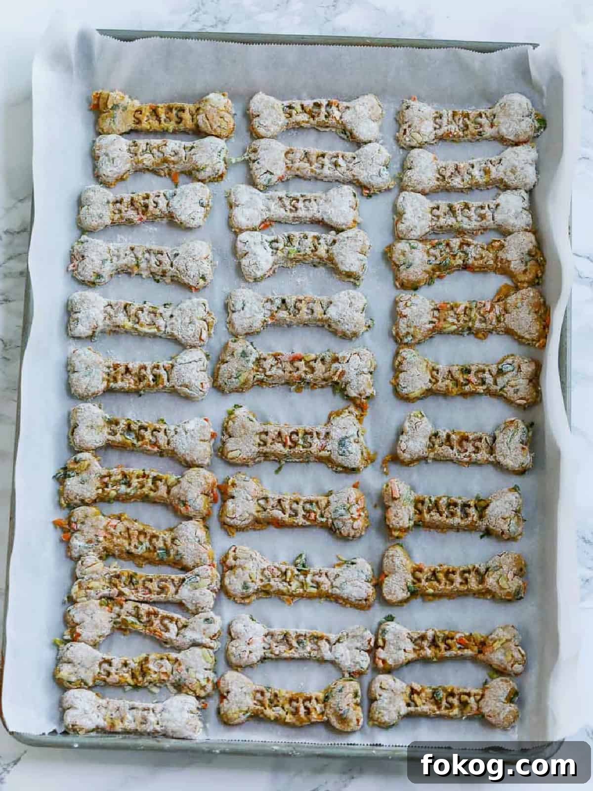 Homemade Dog Treat Recipes: Simple, Nutritious Snacks for Dogs 7 Sheet pan of cut out dog treats