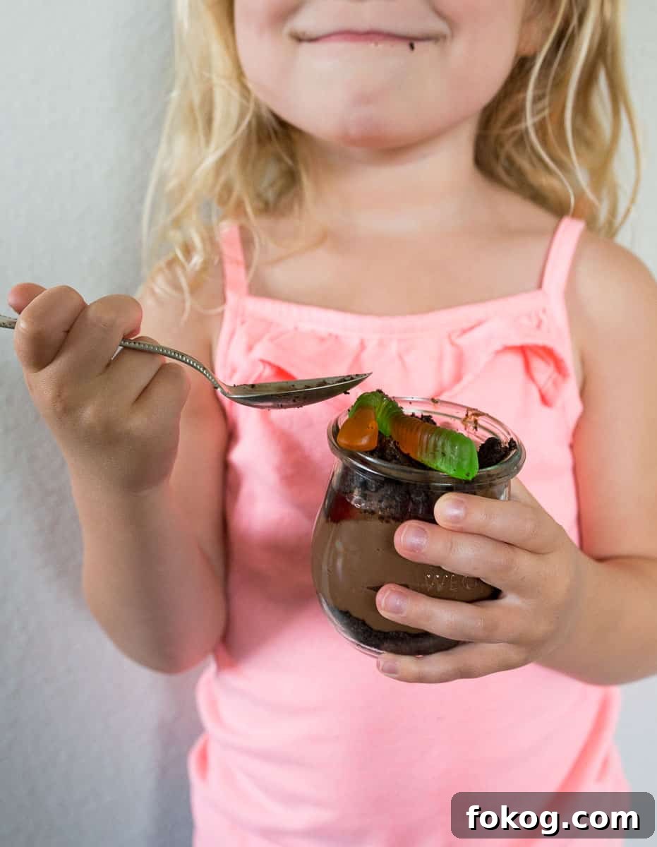 kid eating dirt pudding cups