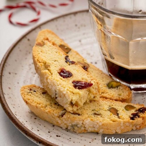 Cranberry, Orange & Pistachio Biscotti Recipe 10 Biscotti served with coffee.