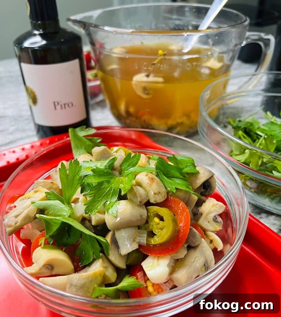 Spicy Italian Pickled Mushrooms Finished and Styled in Jar with Bottle.