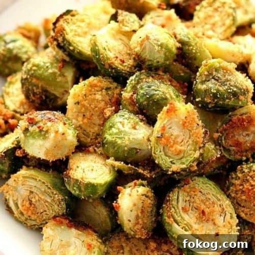 Roasted Brussels sprouts on a white plate.