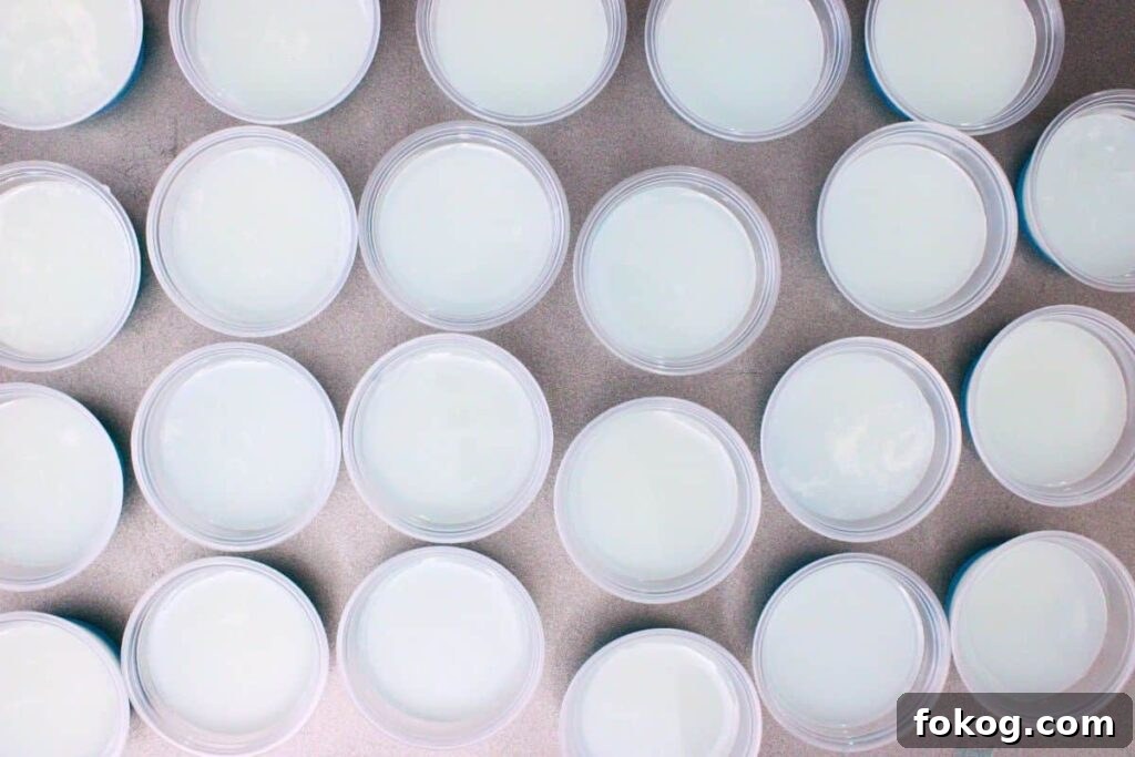 carefully pour white layer over set blue jello
