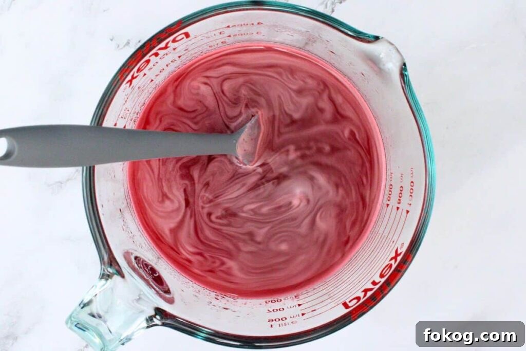 add red jello to boiling water and then stir in berry vodka