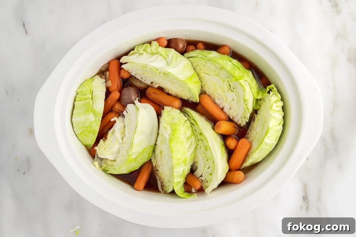 Added the cabbage to the crock pot.