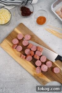 Slice the sausages into about ¾ inch pieces