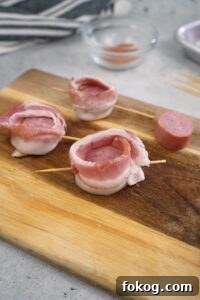 Secure the bacon with a skewer or toothpick through the bottom