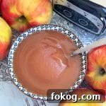 a bowl of cinnamon applesauce from the crockpot, ready to eat