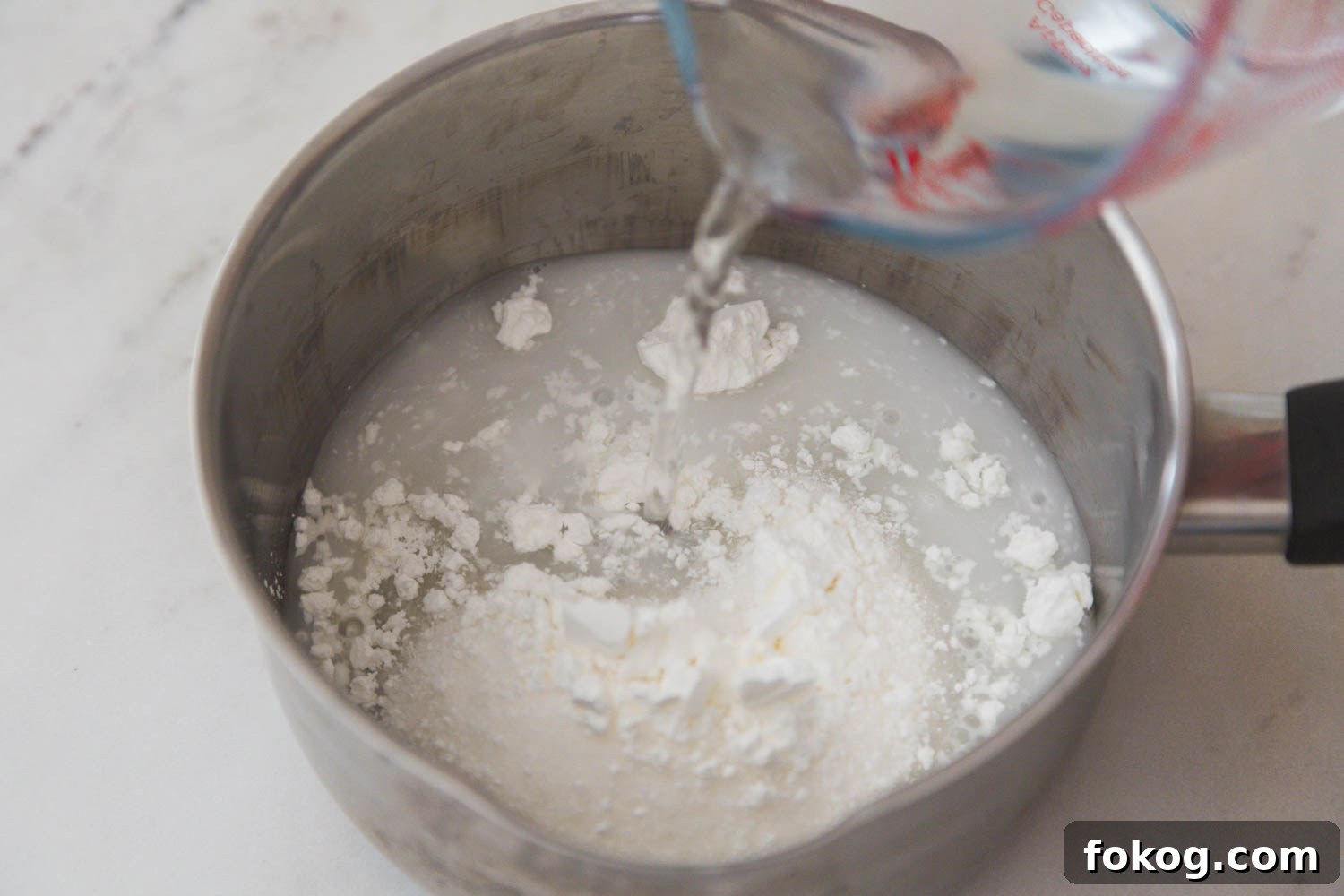 Fresh Strawberry Pie Recipe: Classic No-Bake Summer Dessert 4 Combining water with cornstarch and sugar in a saucepan