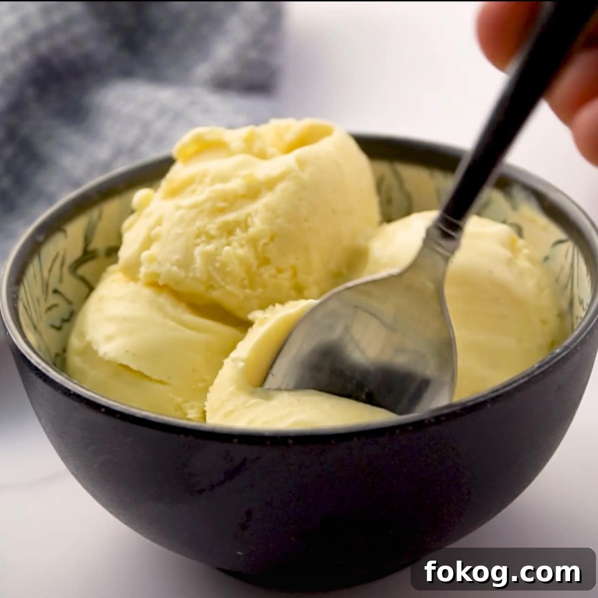 Homemade Vanilla Ice Cream (No Ice Cream Maker Needed) 11 eating with a spoon homemade vanilla ice cream