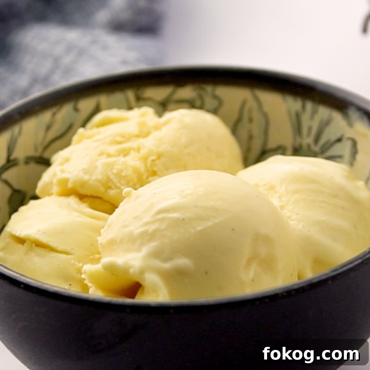 Homemade Vanilla Ice Cream (No Ice Cream Maker Needed) 10 bowl of scooped vanilla ice cream