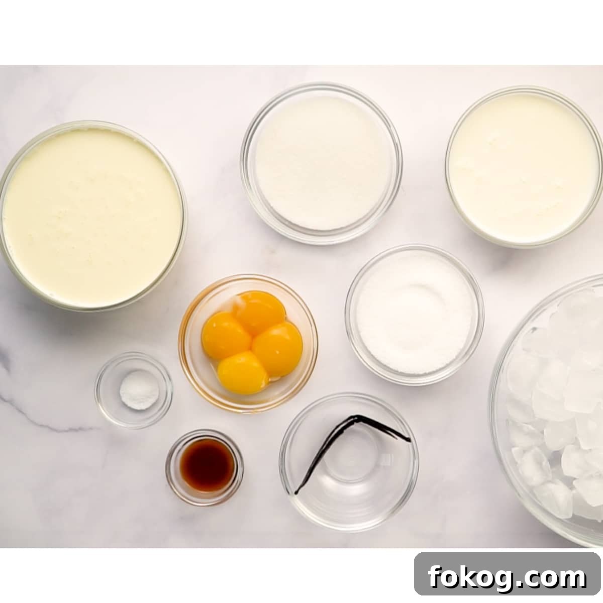 Homemade Vanilla Ice Cream (No Ice Cream Maker Needed) 5 homemade vanilla ice cream without a n ice cream maker ingredients cream, milk, egg yolks, sugar, vanilla extract, vanilla bean (optional), salt and rock salt