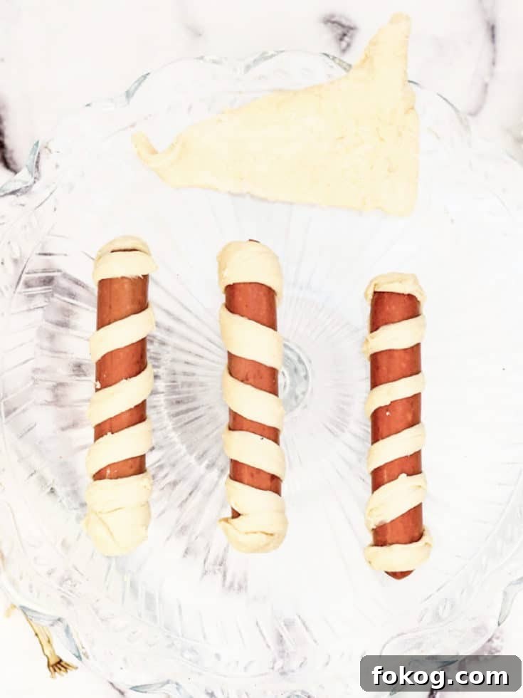 Mummy Hot Dogs Recipe for Halloween Party Snacks 4 wrapped mummy dogs