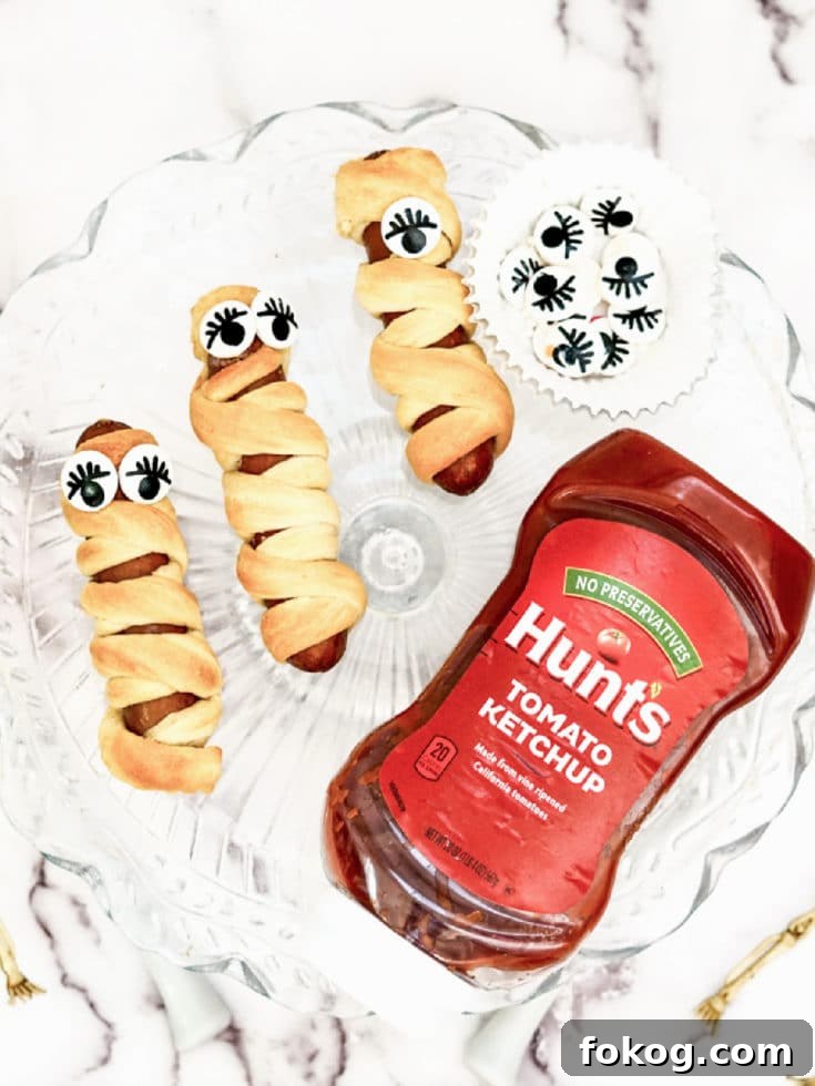 Mummy Hot Dogs Recipe for Halloween Party Snacks 5 mummy dog eyes
