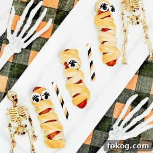 Mummy Hot Dogs Recipe for Halloween Party Snacks 6 Crescent roll mummy dogs