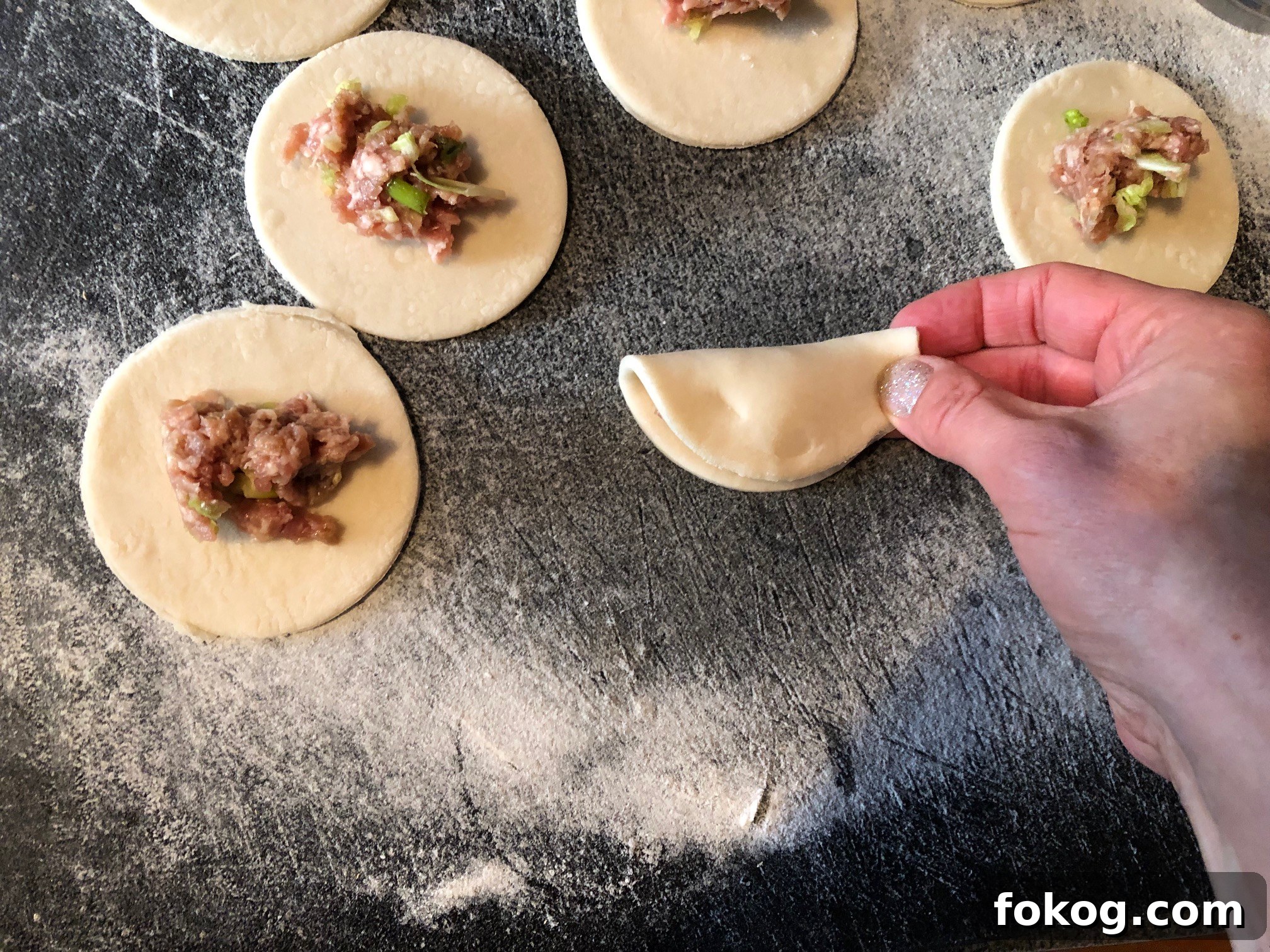 Chinese Potstickers - fold over, pinch and seal, as you would a perogy