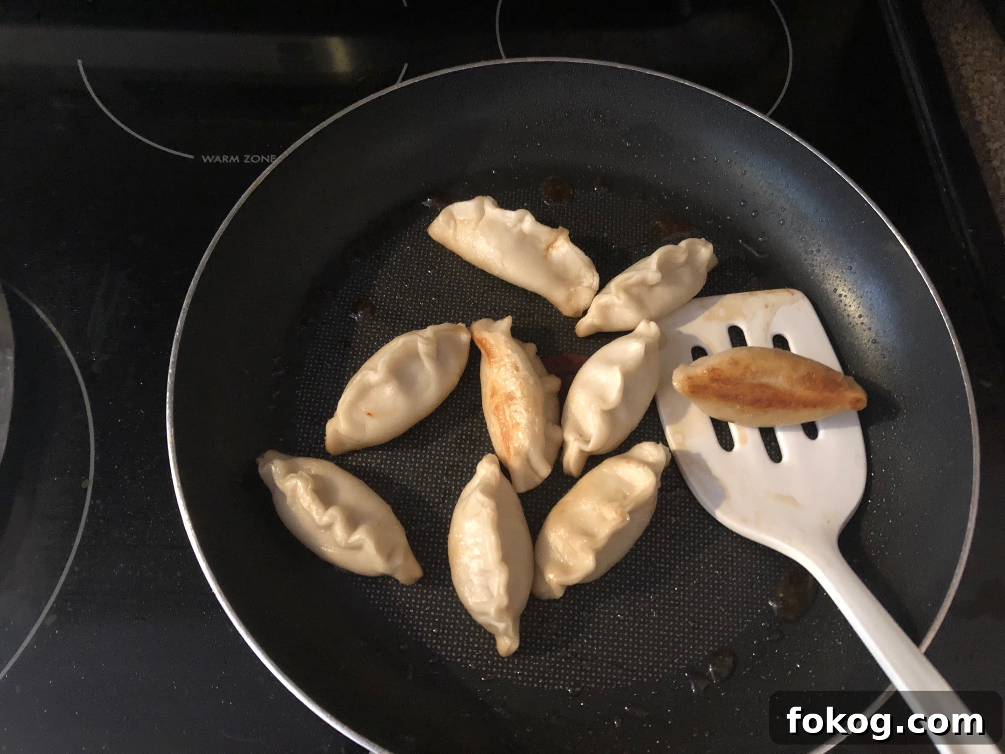 Chinese Potsticker Cooking- brown on one side