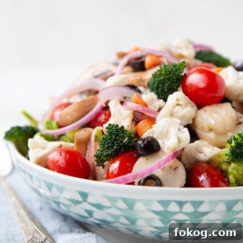 marinated vegetable salad in a low decorative bowl.
