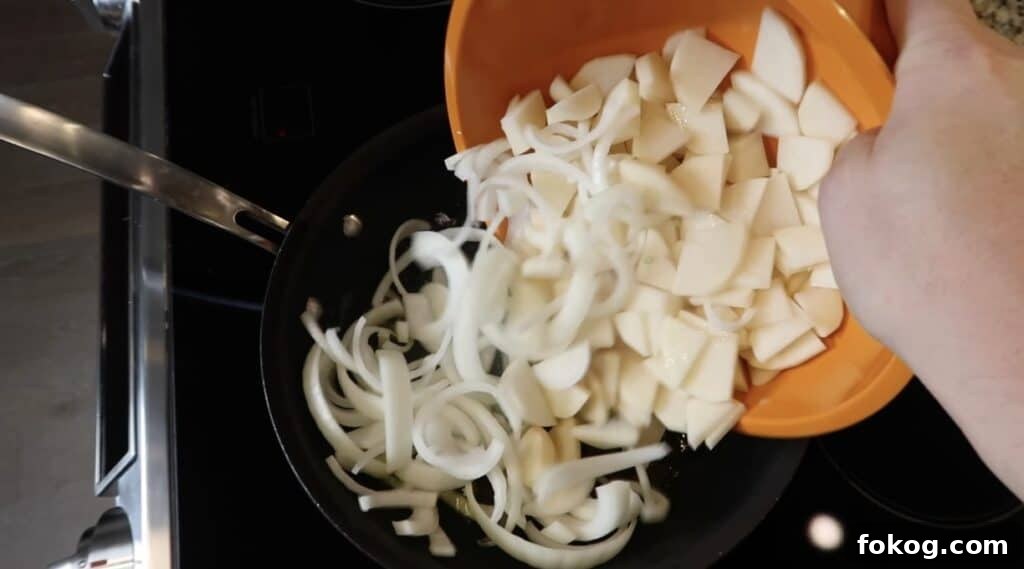 Spanish Omelette Scramble Recipe: Quick Tortilla Española Twist 12 potatoes and onions in skillet