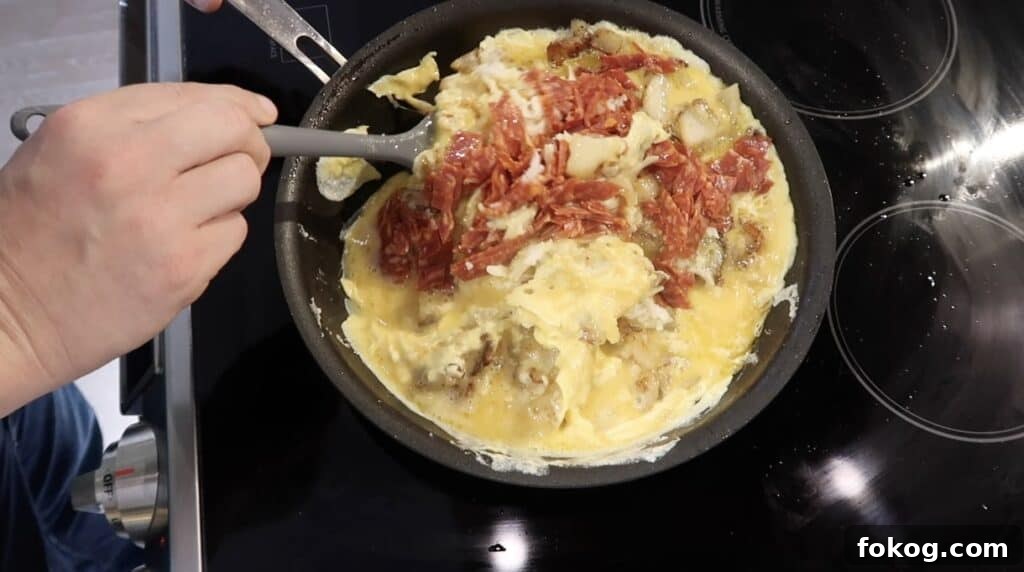 Spanish Omelette Scramble Recipe: Quick Tortilla Española Twist 20 folding eggs
