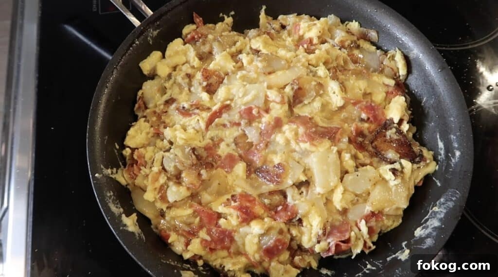 Spanish Omelette Scramble Recipe: Quick Tortilla Española Twist 21 almost done