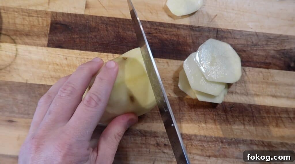 Spanish Omelette Scramble Recipe: Quick Tortilla Española Twist 5 Slicing potatoes into thin disks