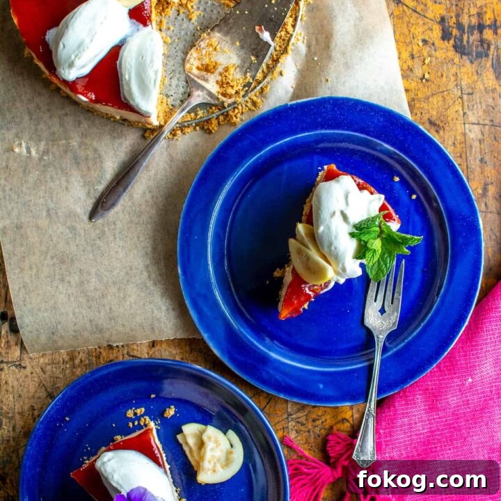 Two blue plates with slices of guava cheesecake on each plate.