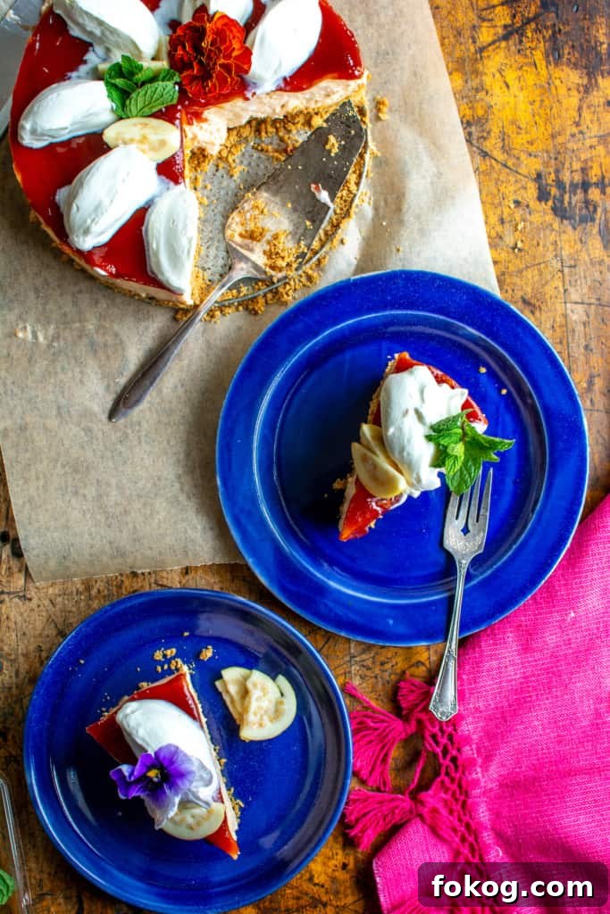 Two blue plates with slices of guava cheesecake on each plate. 