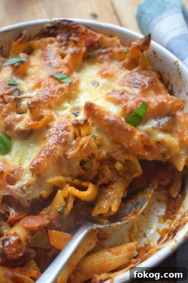 Bell pepper nad bacon pasta bake in a serving dish
