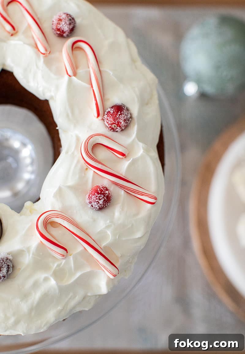 Gingerbread cake with whipped cream and candy canes.