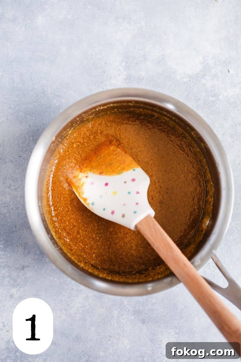 3-Ingredient Peanut Butter Cereal Energy Bites 4 Melted peanut butter in a small saucepan.