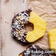 Chocolate-Covered Pineapple Recipe: Sweet Tropical Treat in Minutes 16 chocolate covered pineapple ring with coconut flakes