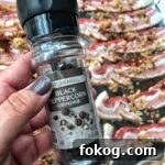 A black pepper grinder.