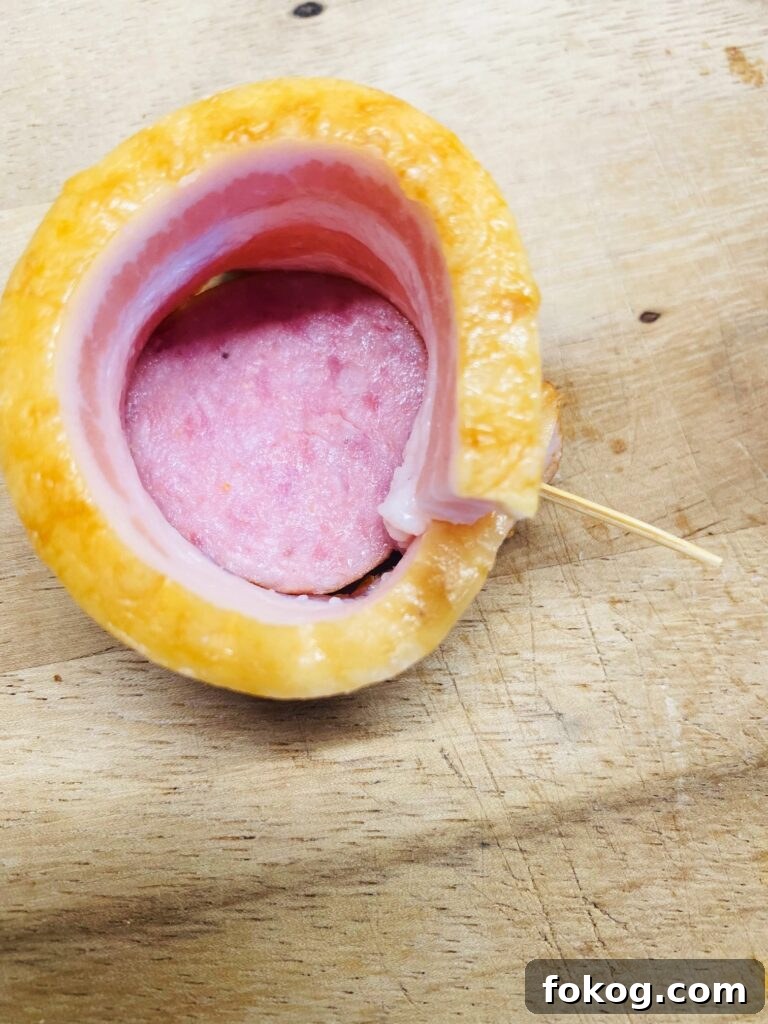 Cheesy Caramelized Onion Bacon-Wrapped Pig Shots: Party Appetizer 4 bacon wrapped sausage before filling