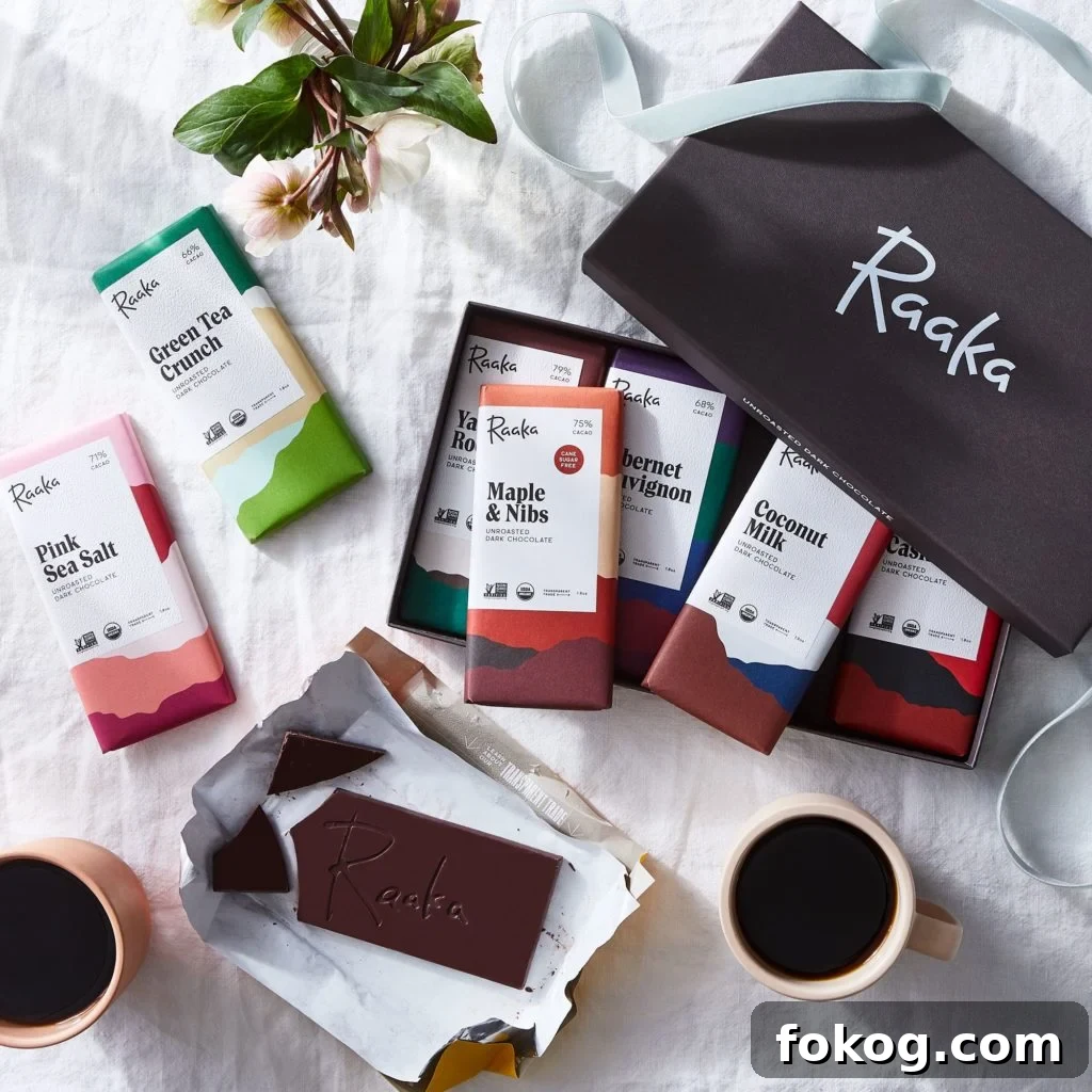 6 Organic Chocolate Brands Low in Heavy Metals 2 an opened organic chocolate gift box with different flavors of chocolates from Raaka on the table