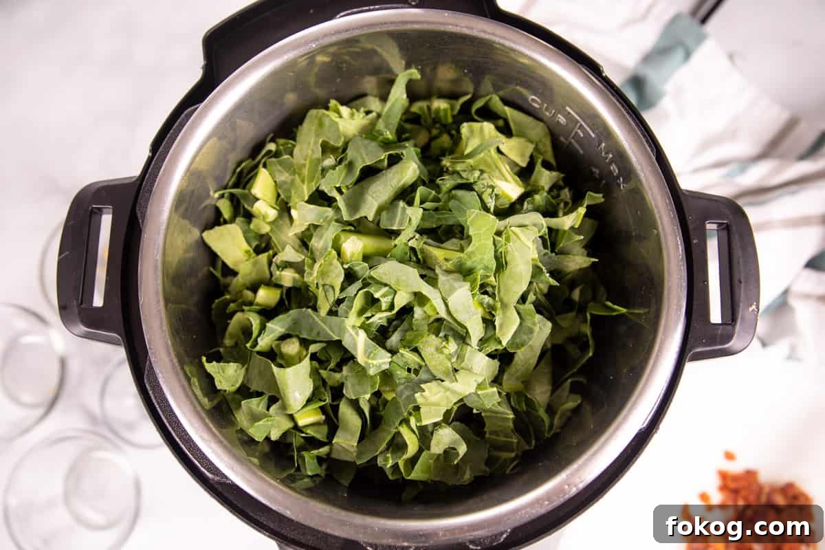 Instant Pot Collard Greens with Bacon Collard Greens in inner pot of instant pot.