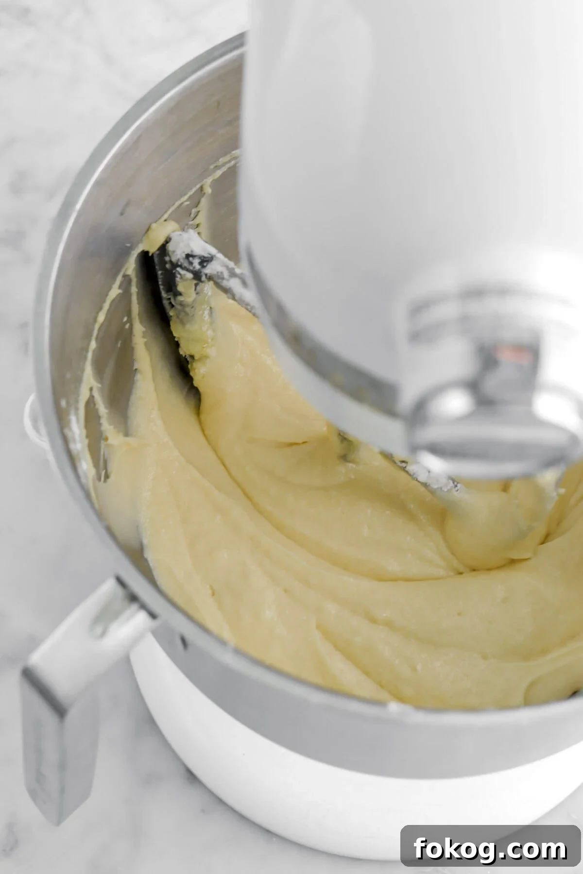Classic Vanilla Cake with Smooth Buttercream Frosting 12 cake batter in stand mixer.